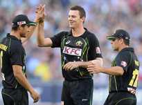 Australia Josh Hazlewood celebrates the wicket of Michael Lumb.