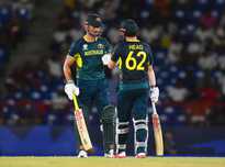 Travis Head and Marcus Stoinis hit fifties in Australia's fourth straight win of the T20 World Cup